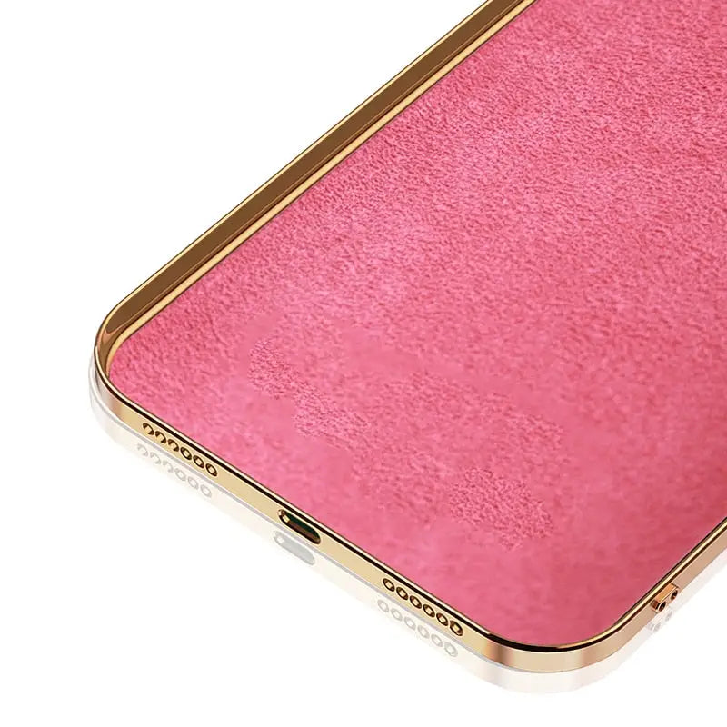 the back of a pink iphone case