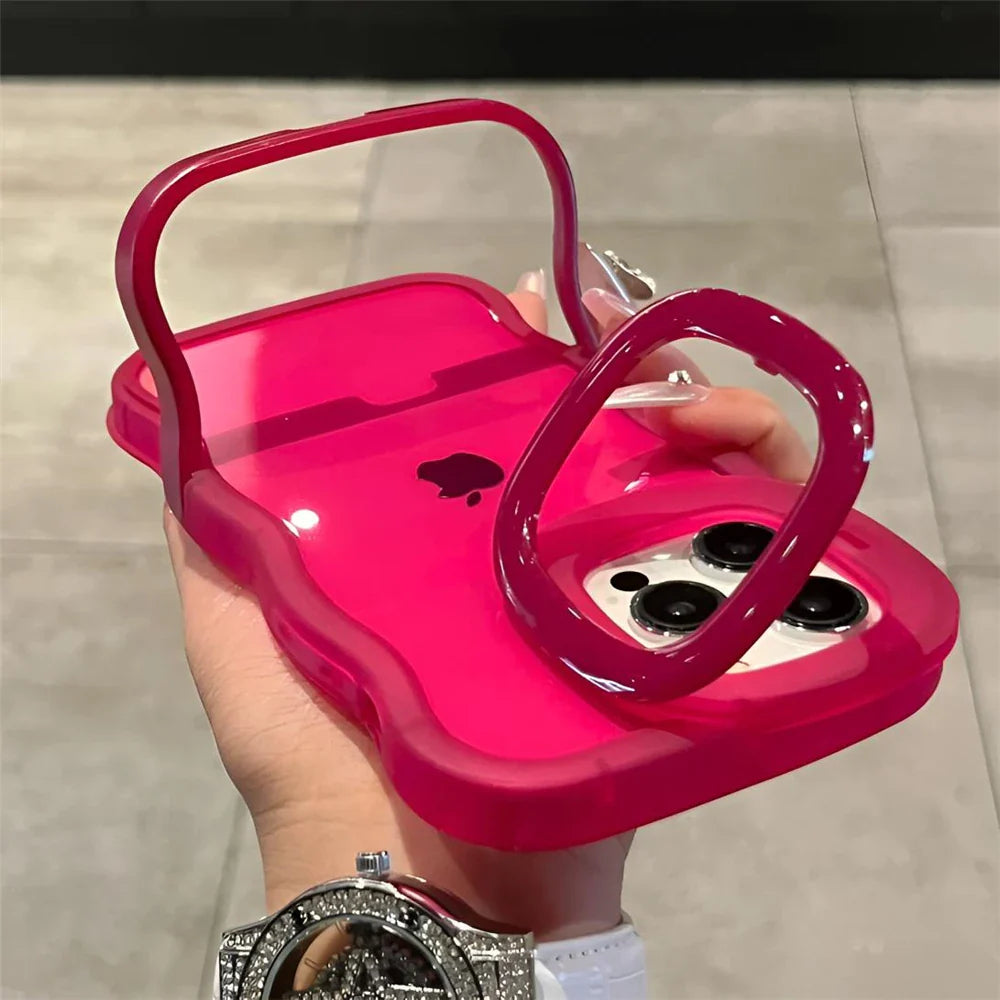 Pink iPhone case with handle.