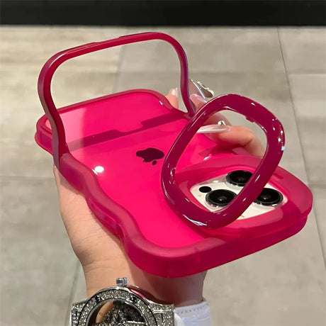 Pink iPhone case with handle.