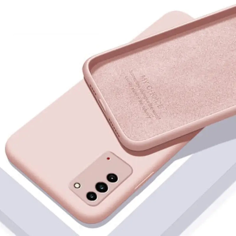 the back of a pink iphone case
