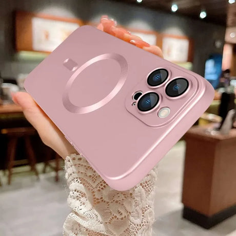 Pink iPhone case with a triple-camera design.