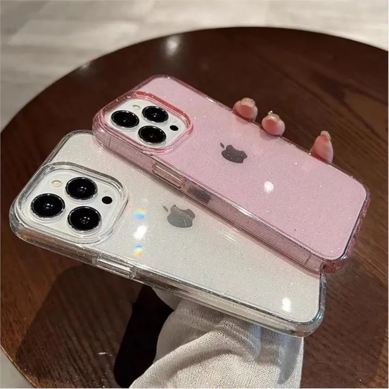 a pink iphone case with two black lenses on it