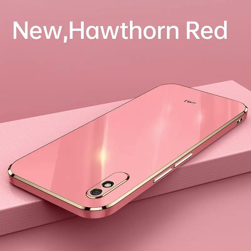 a pink iphone case with the words new red on it