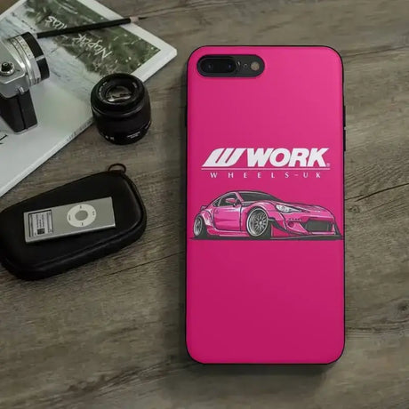 A pink iphone case with the words’work’on it