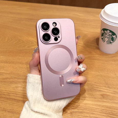 Pink iPhone with multiple camera lenses and a MagSafe charging ring.