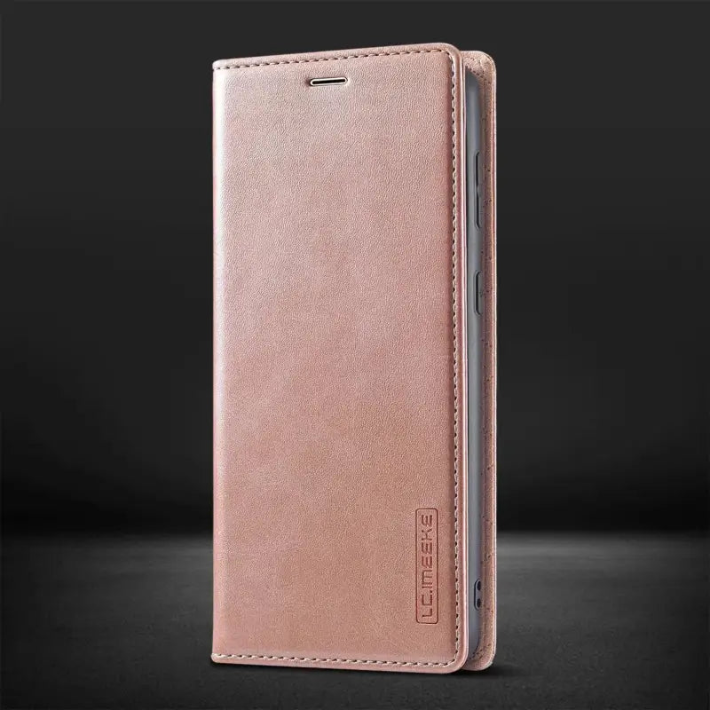 the back of a pink leather iphone case