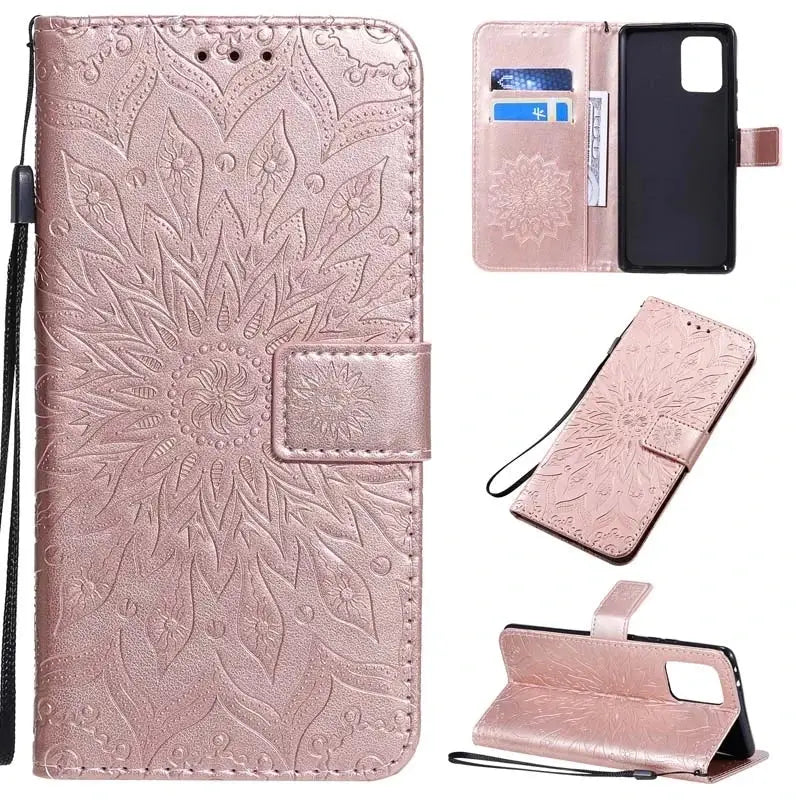 a pink leather wallet case with a flower design