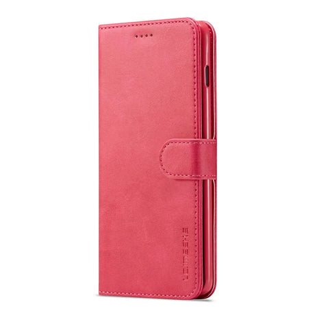 Pink leather wallet-style smartphone case with a closure flap.