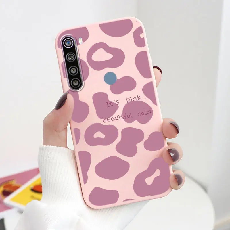 a pink leopard print phone case with the words’be wild ’