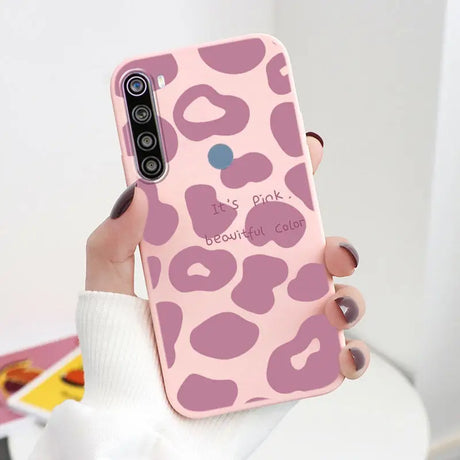 a pink leopard print phone case with the words’be wild ’