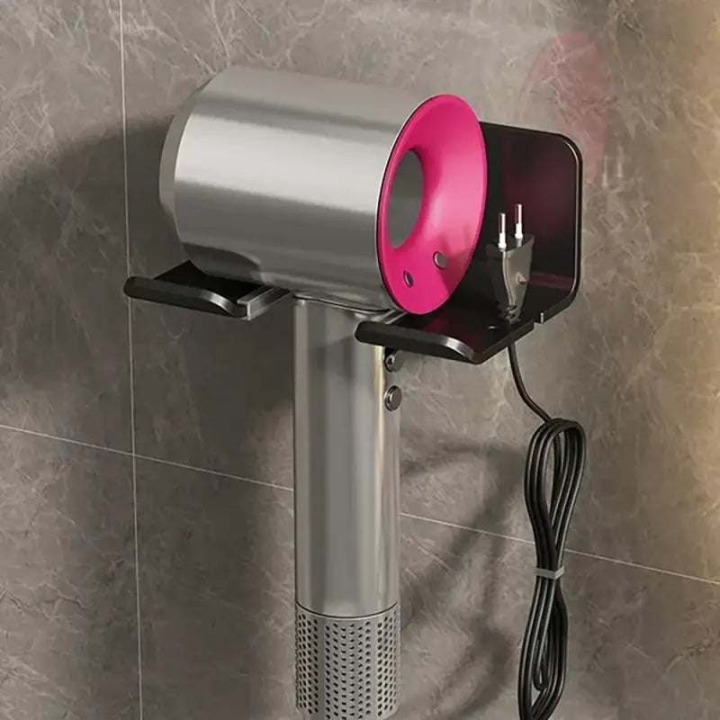 a pink light is on the wall next to a shower