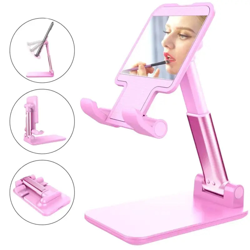 a pink makeup mirror with a mirror on it