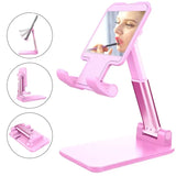 a pink makeup mirror with a mirror on it