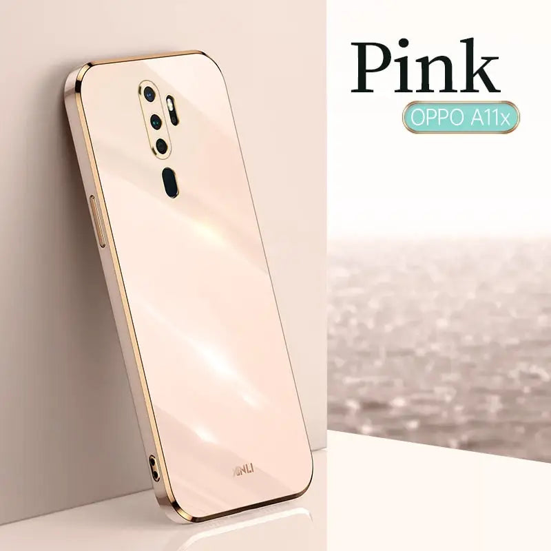 the pink opix phone is displayed on a table