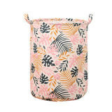 a pink and orange floral print laundry bag