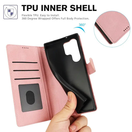 Someone is holding a pink phone case with a black phone in it