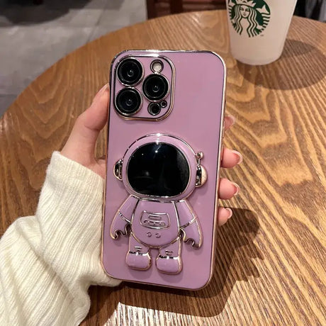 A pink phone case with a cartoon character on it