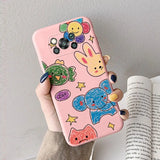 a pink phone case with colorful fish and fish design