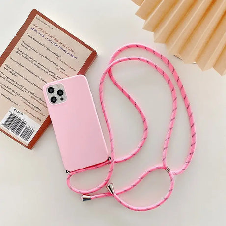 a pink phone case with a pink cord