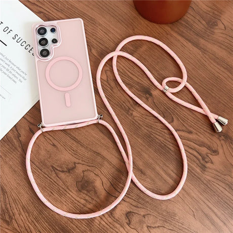Pink phone case with crossbody strap.