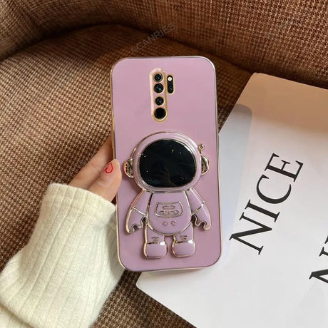 a pink phone case with a cartoon character on it