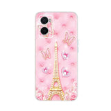 a pink phone case with a eiffel tower and hearts