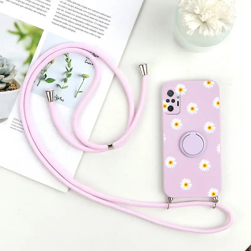 a pink phone case with a flower design