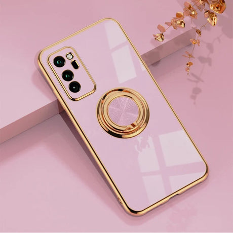 a pink phone case with a gold ring