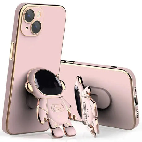 A pink phone case with a gold phone holder