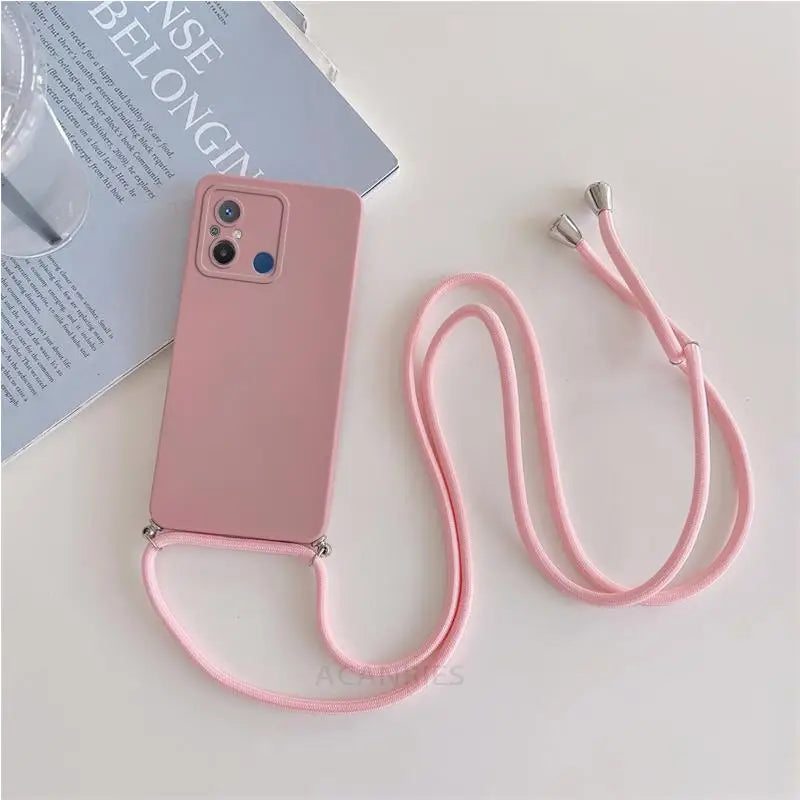 there is a pink phone case with a lanyard attached to it