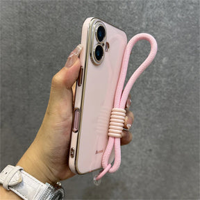 Pink phone case with lanyard.