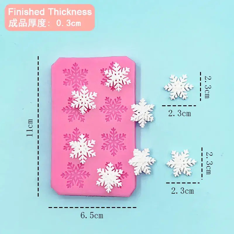 a pink phone case with snowflakes on it