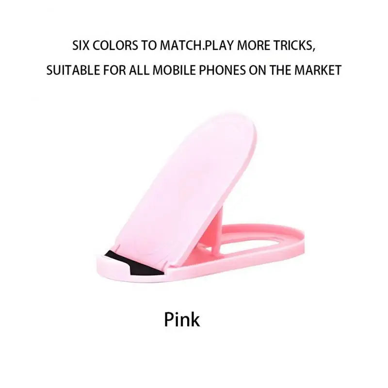 a pink phone holder with a black and white phone