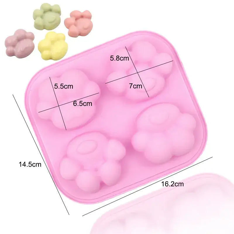 a pink plastic container with six small balls inside