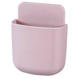 A pink plastic cup with a lid