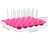 a pink plastic ice tray with two popss and two pops