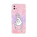 a pink and purple glitter phone case with a hand holding a heart