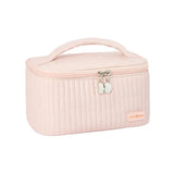 the pink quilted cosmetic case is shown with a small metal lock