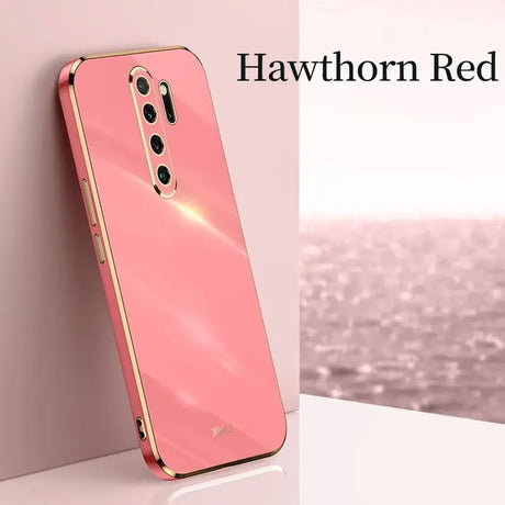 the back of a pink hua redmix smartphone