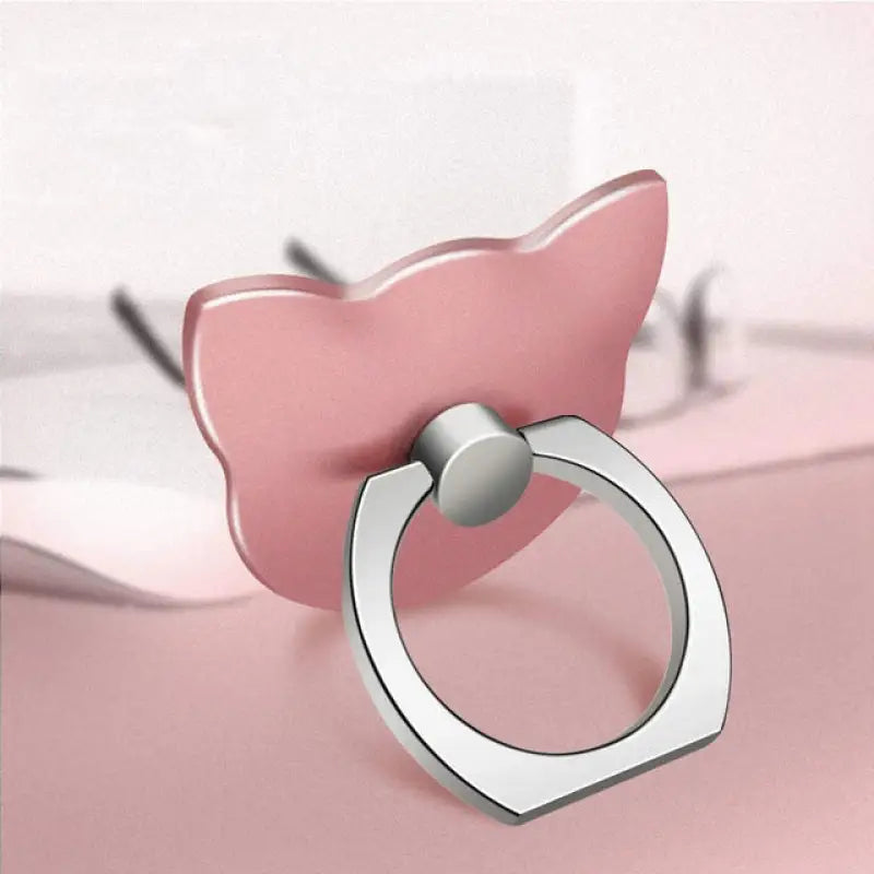 a pink ring with a pink bow on it