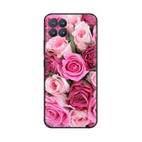 a close up of a pink rose phone case with a flower design