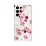 pink roses and white petals on a white background