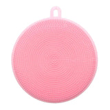 a pink round brush with a circular handle