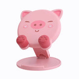 a pink pig toy on a white background