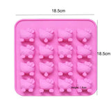 a pink silicon silicon silicona tray with a bunch of small pink plastic animals