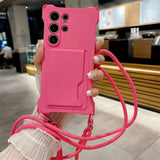 Pink smartphone case with a card slot and an attached lanyard.