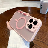 Pink smartphone case designed to look like a cute camera, with a circular lens detail and bow accent.