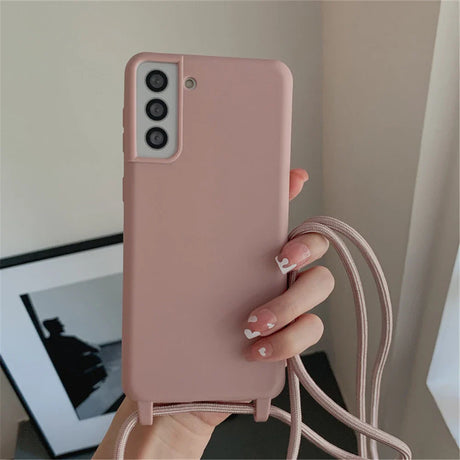 Pink smartphone case with a lanyard.