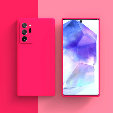 Pink smartphone with a triple camera setup and a vibrant display showing abstract geometric shapes.