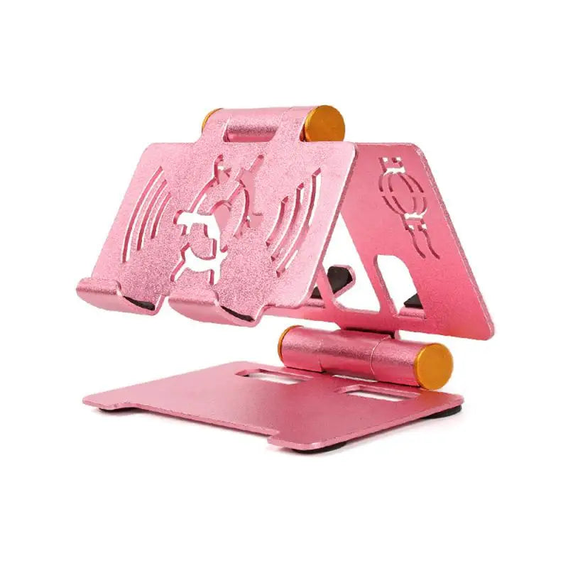 a pink tablet stand with a pink phone holder